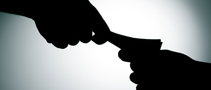 A bribe changing hands 