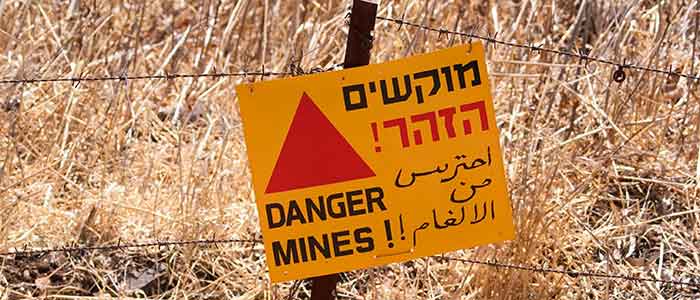 Land mine warning sign Land mine warning sign