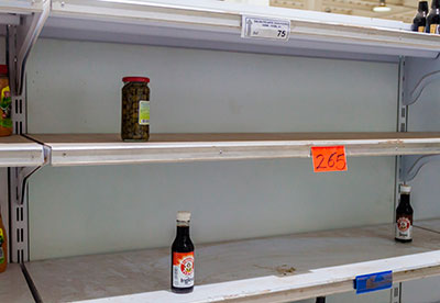 Empty shelves in a Venezuelan supermarket. 