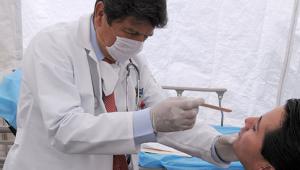 A Mexican doctor a examining patient
