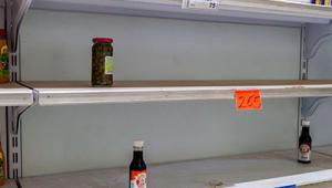 Empty shelves in a Venezuelan supermarket. 