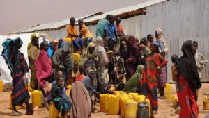 Horn of Africa collecting water CATE TURTON DFID