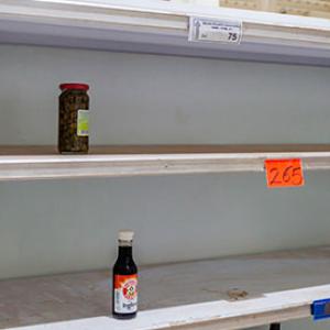 Empty shelves in a Venezuelan supermarket. 