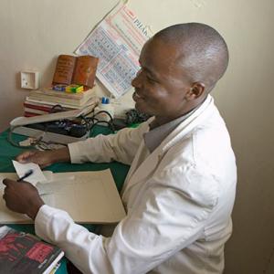 A doctor consulting with patients. 