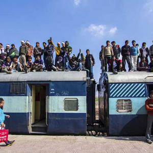 Crowded train waiting to depart.