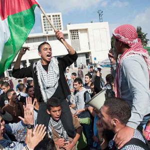 Palestinians protesting Israeli occuptation