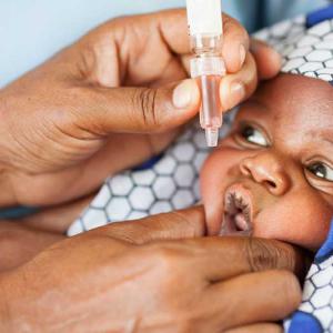 A child being vaccinated for polio