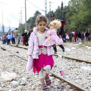 A young refugee walking in Europe