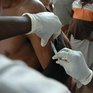 A man being vaccinated for yellow fever. 