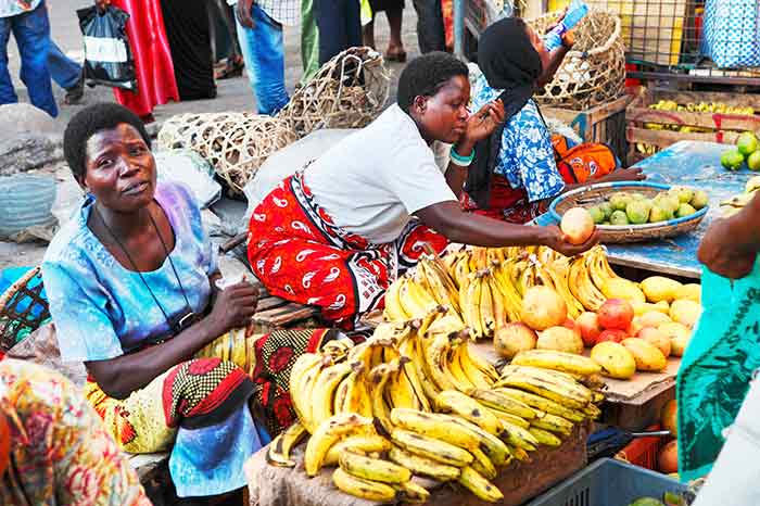 Women selling fruit at market
