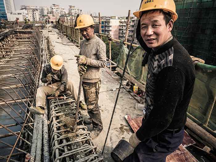 Employees at work on a construction site