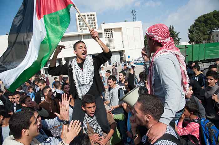 Palestinians protesting Israeli occuptation