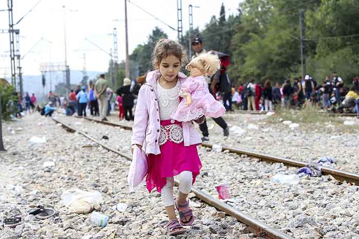 A young refugee walking in Europe