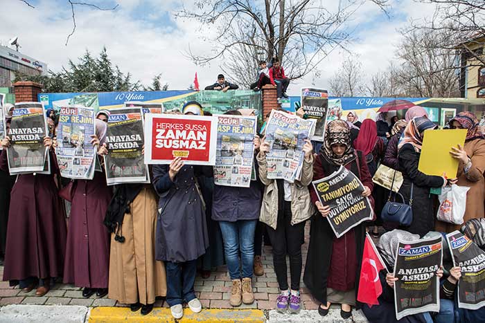 People protest the government takeover of Turkish newspaper Today's Zaman.